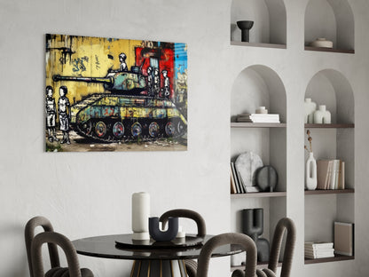 Vibrant street art glass wall panel depicting children and military tank in yellow, red, and blue tones, displayed above a dining table in modern interior.