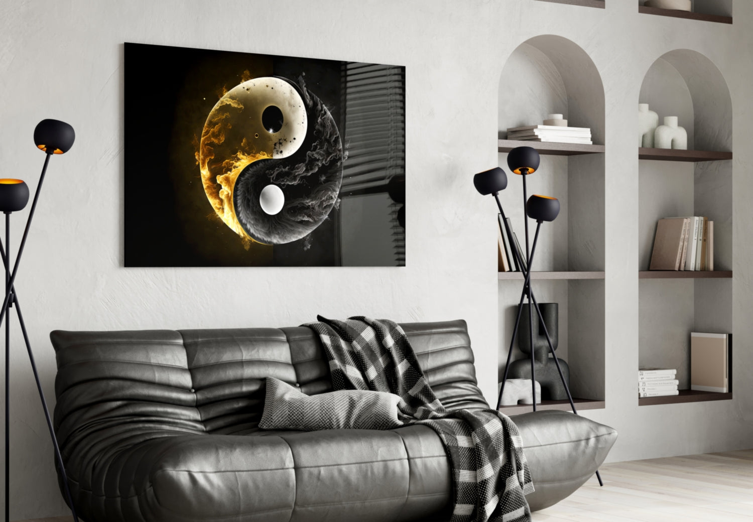 Yin Yang glass wall art with gold and black marble textures displayed above a gray leather sofa in a modern living room.