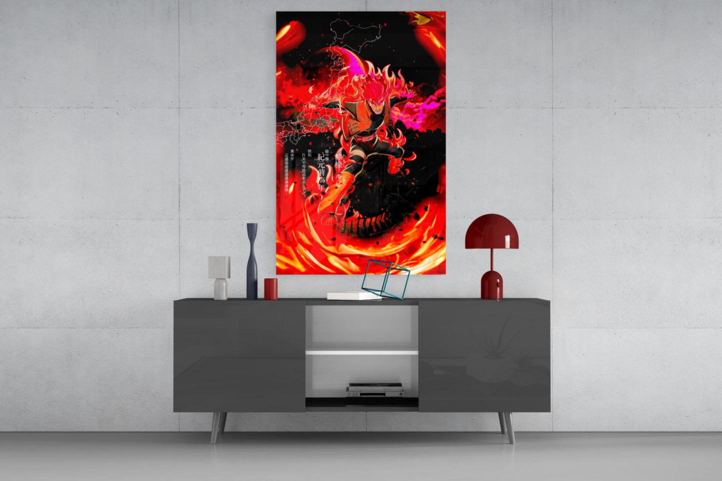 Vibrant red and magenta manga glass wall art depicting a fiery character displayed above a dark gray media console in a modern interior setting.