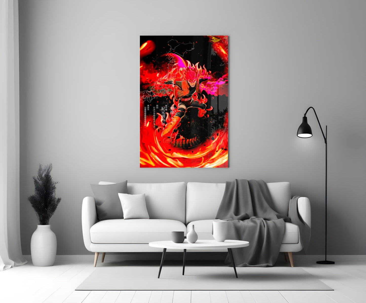 Vibrant red and magenta manga-style glass wall art featuring a demon character displayed above a white sofa in a minimalist living room.
