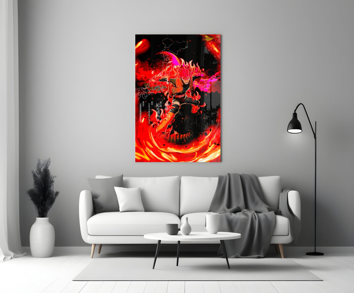 Vibrant red and magenta manga-style glass wall art featuring a demon character displayed above a white sofa in a minimalist living room.