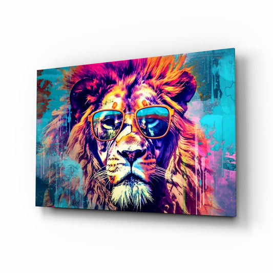 Angled perspective view of colorful pop art lion wearing gold-framed sunglasses on turquoise and magenta glass panel with shadow.