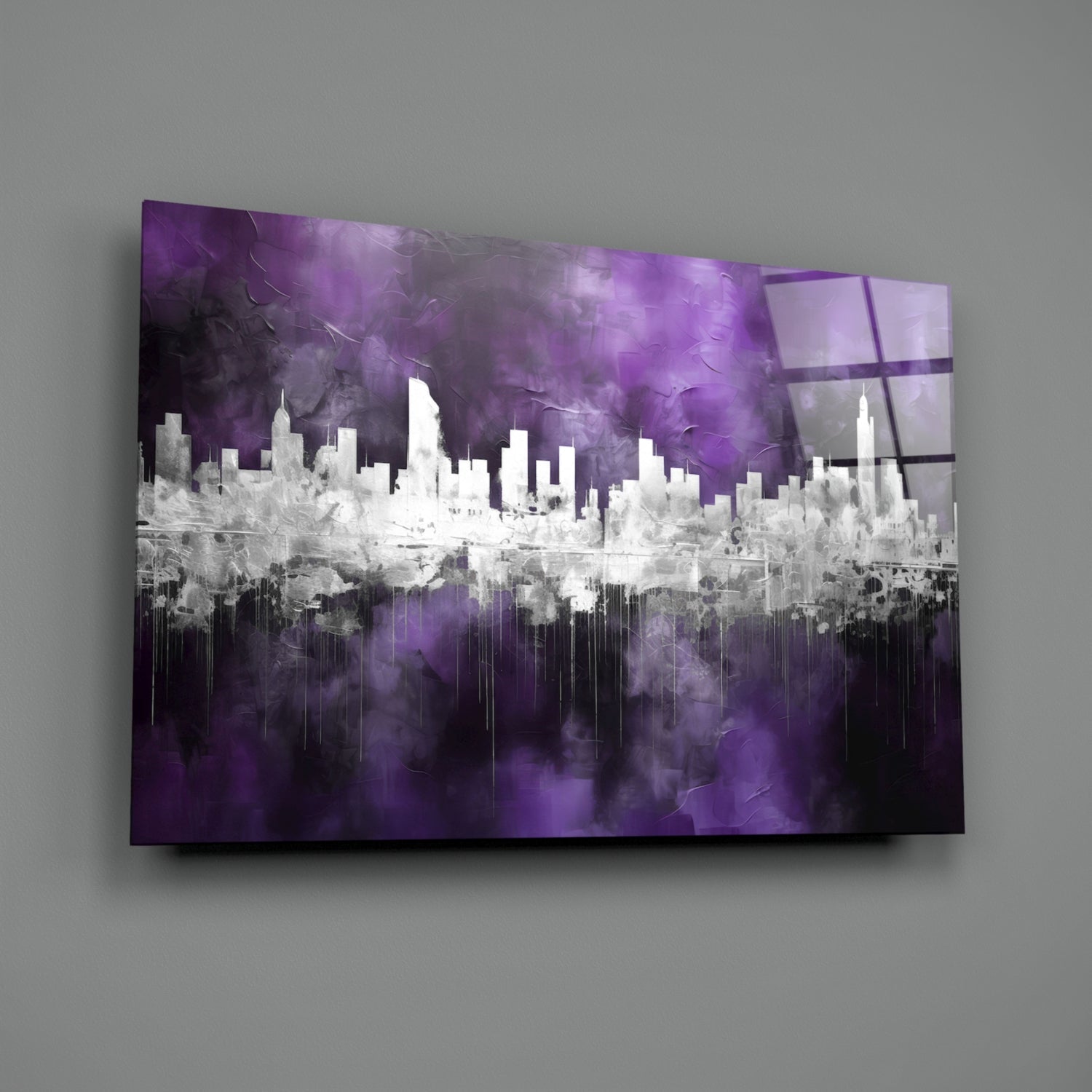 Glass wall art featuring a white city skyline silhouette against a dramatic purple and black textured background, mounted on gray wall.