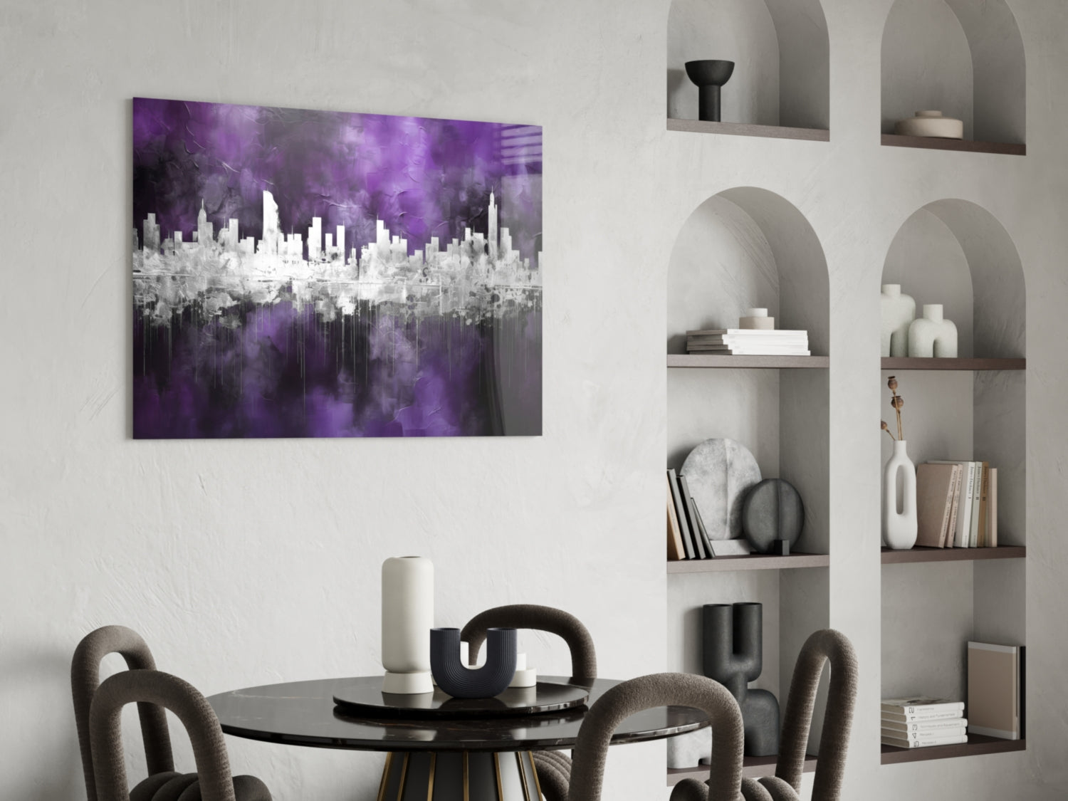Purple and white cityscape glass art hanging above a black round dining table with gray upholstered chairs.