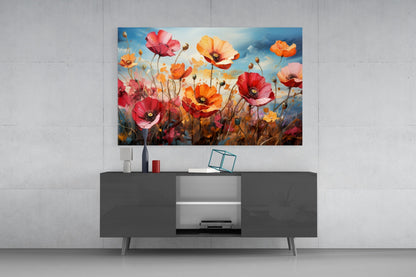Vibrant poppy flower glass art hanging above a dark media console with decorative accessories.
