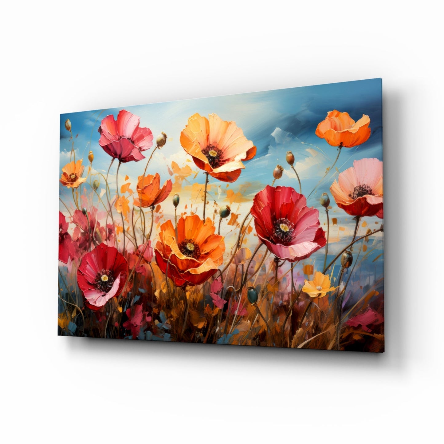 Angled perspective of glass wall art featuring vibrant red, orange, and pink poppies against a blue sky with green stems and buds.