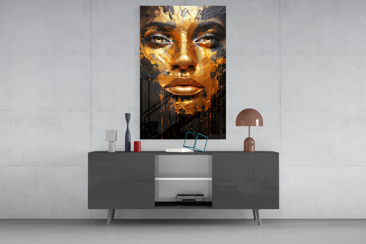 Golden Melt Glass Wall Art featuring a woman's face in gold and black paint displayed above a dark console table with decorative accessories.