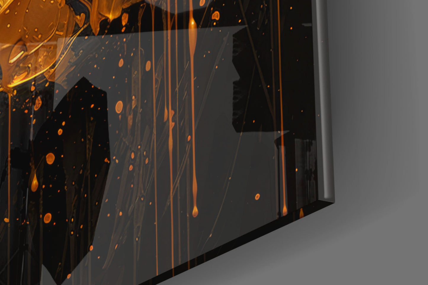Three-dimensional glass wall art panel with golden amber liquid and drip effects against dark background, angled perspective view.