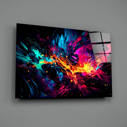 Modern glass wall art mounted on gray wall displaying vibrant cyan, magenta, yellow, and orange abstract explosion with light accents.