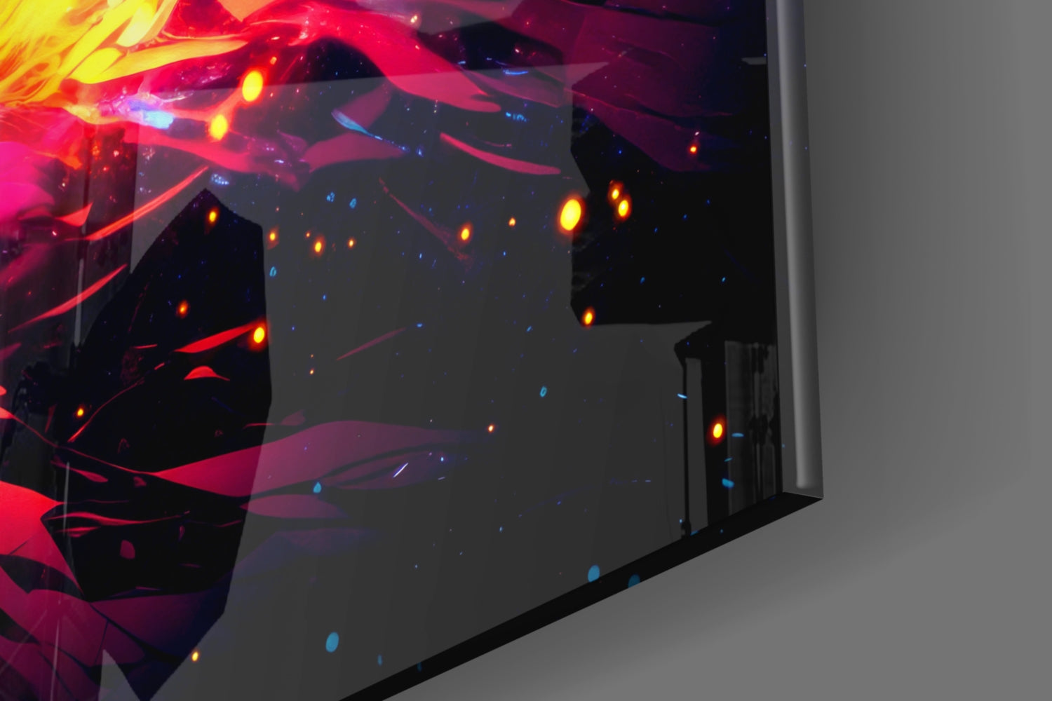 Close-up angled view of illuminated glass wall art featuring red, yellow, and blue glowing lights against dark abstract design on gray wall.