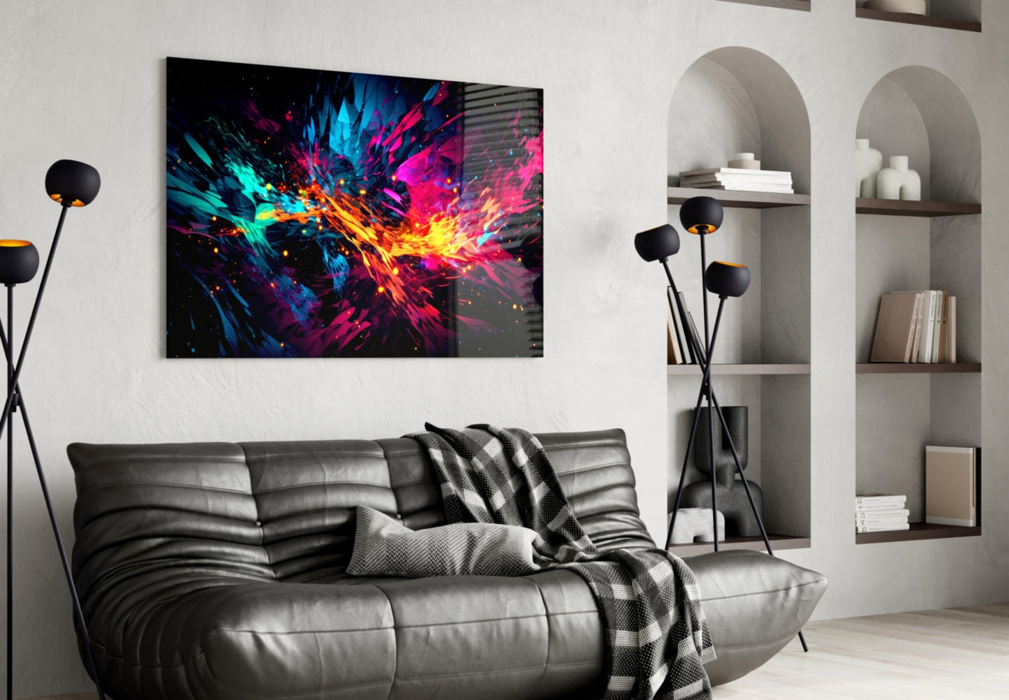 Vibrant multicolored abstract glass art with blue, pink, yellow, and cyan explosion pattern displayed above gray leather sofa in modern living room interior.