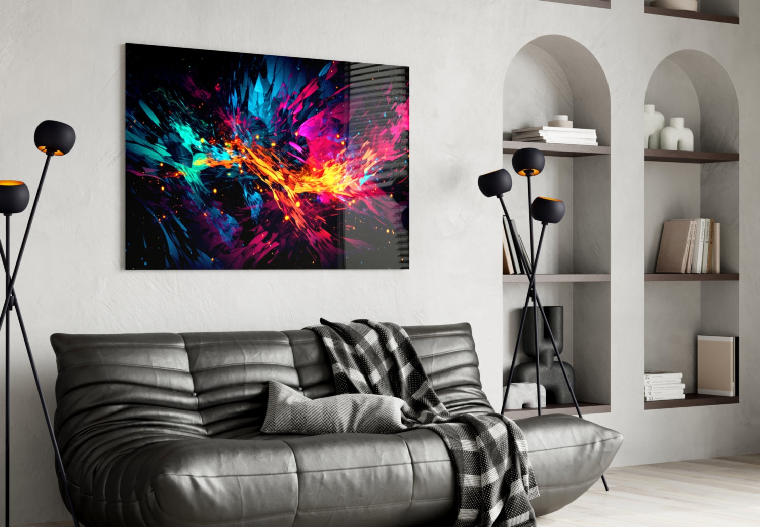 Vibrant multicolored abstract glass art with blue, pink, yellow, and cyan explosion pattern displayed above gray leather sofa in modern living room interior.