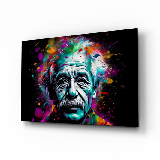 Angled perspective of glass wall art displaying a monochromatic portrait surrounded by vibrant multicolored paint splatters and swirls against black background.