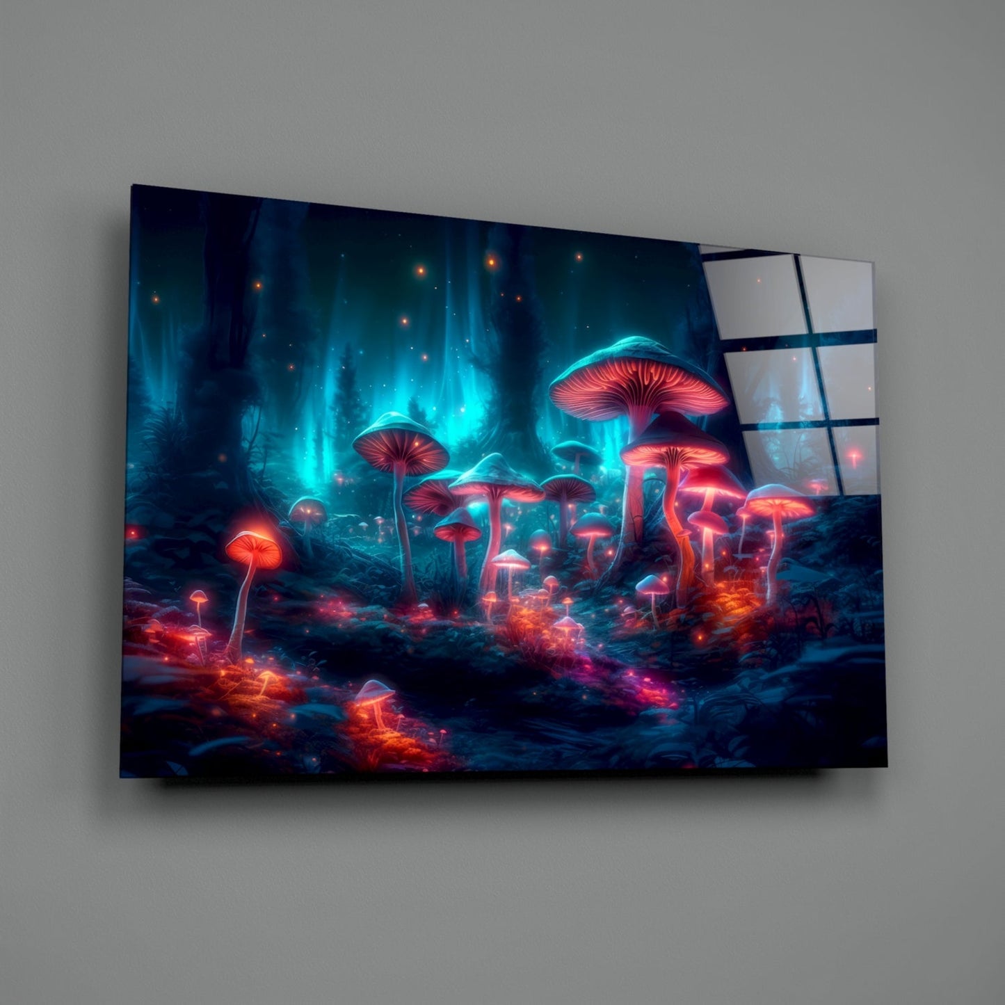 Angled front view of glowing neon mushroom forest glass art panel with red and cyan bioluminescent mushrooms against dark blue landscape, mounted on gray wall.