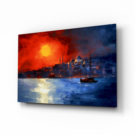 Glass wall art depicting a dramatic red sunset over an Istanbul waterfront with a sailboat on blue water and illuminated mosques.