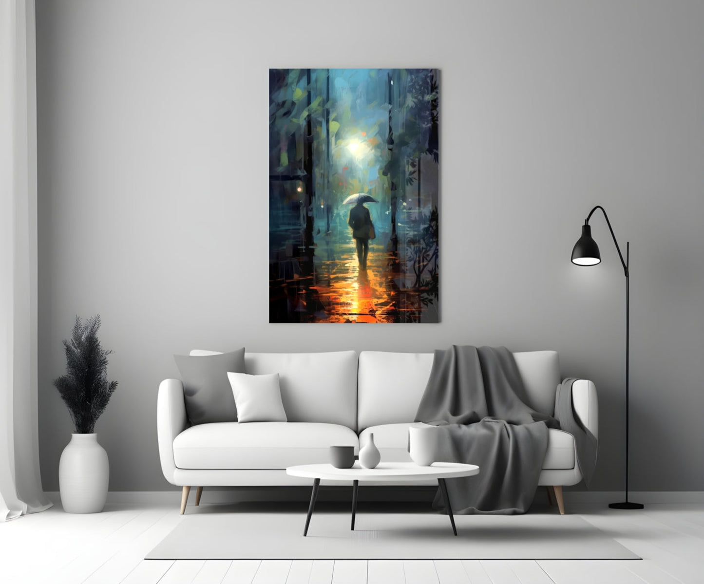 Glass wall art depicting a solitary figure with umbrella walking through a rain-lit urban alley, displayed above a white sofa in a modern living room.