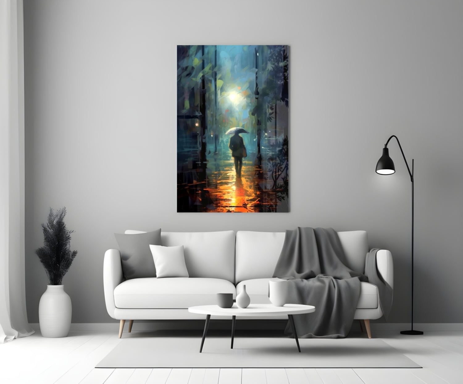 Glass wall art depicting a solitary figure with umbrella walking through a rain-lit urban alley, displayed above a white sofa in a modern living room.
