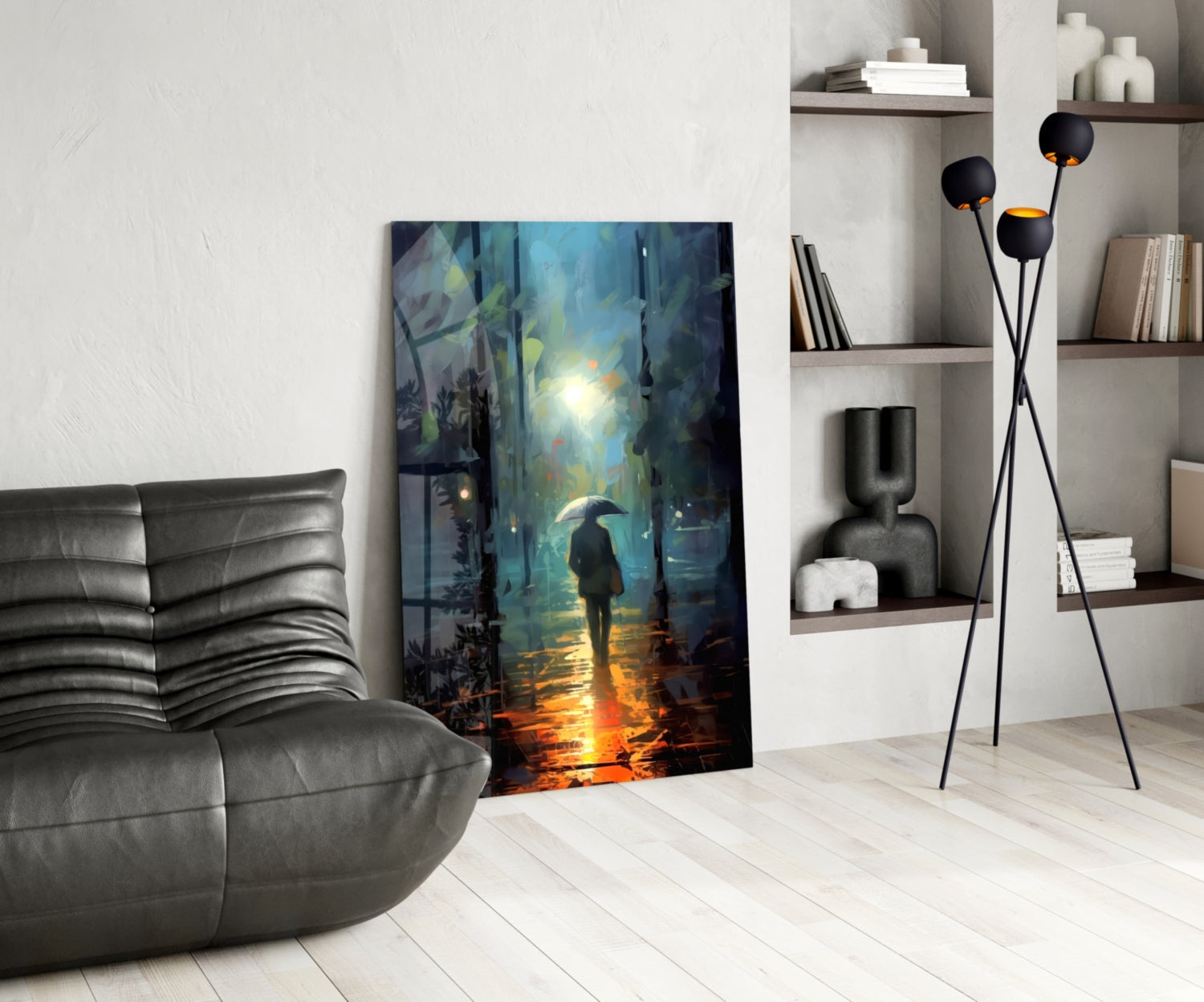 Glass wall art depicting a solitary figure with umbrella standing in a rainy urban street with blue and golden light reflections, displayed in modern living room setting.