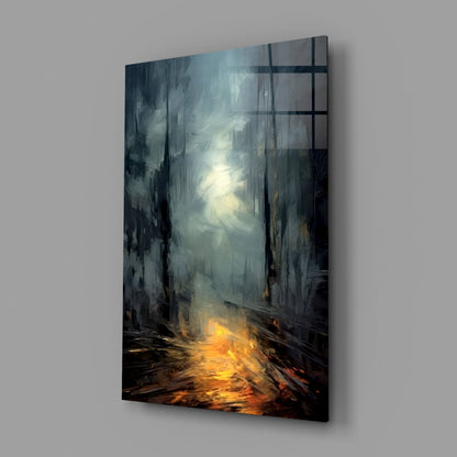 Angled perspective view of glass wall art depicting a misty urban street with golden light at ground level and pale sky above, mounted on gray wall.