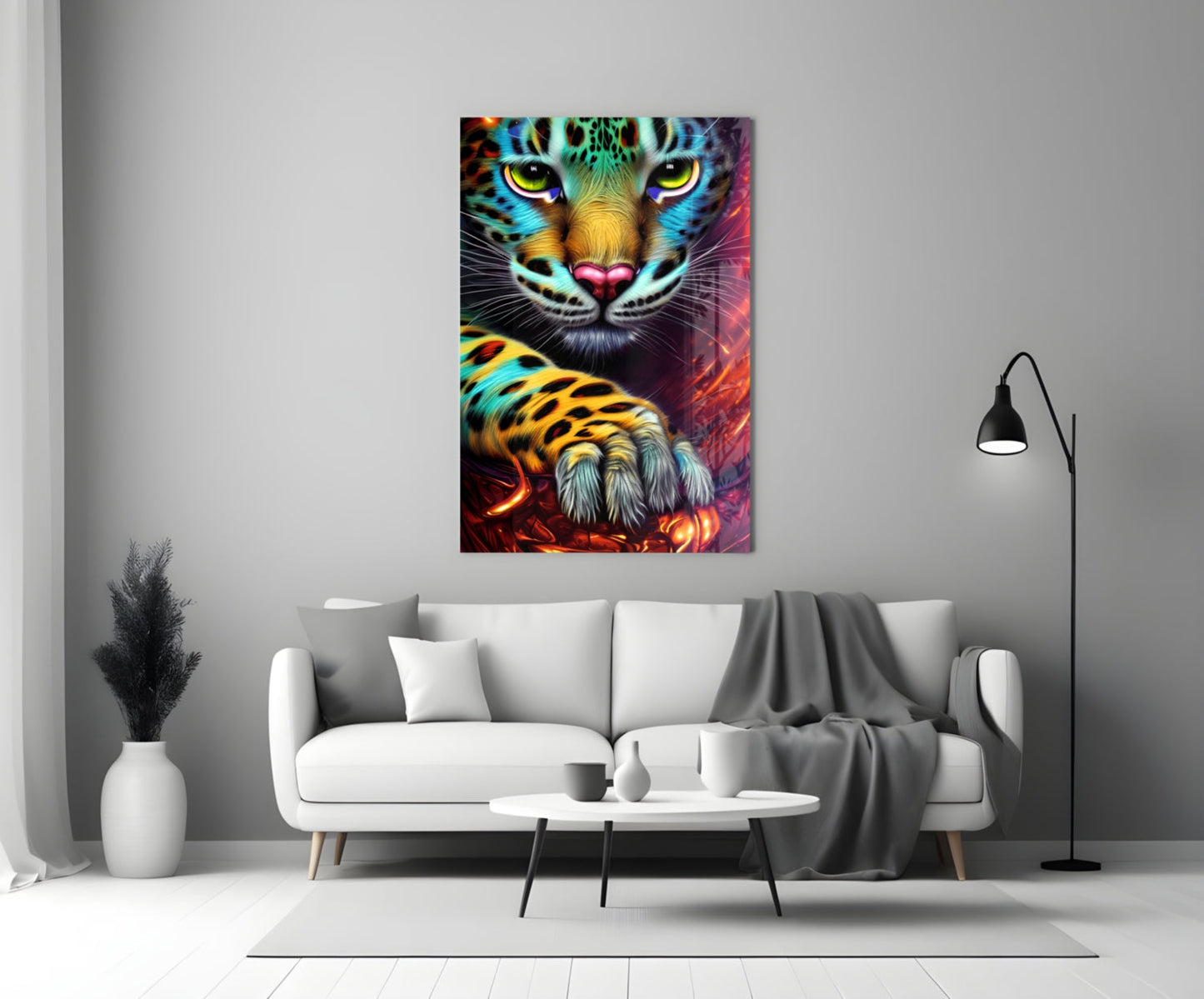 Colorful neon leopard face glass wall art displayed above white sofa in modern living room interior.
