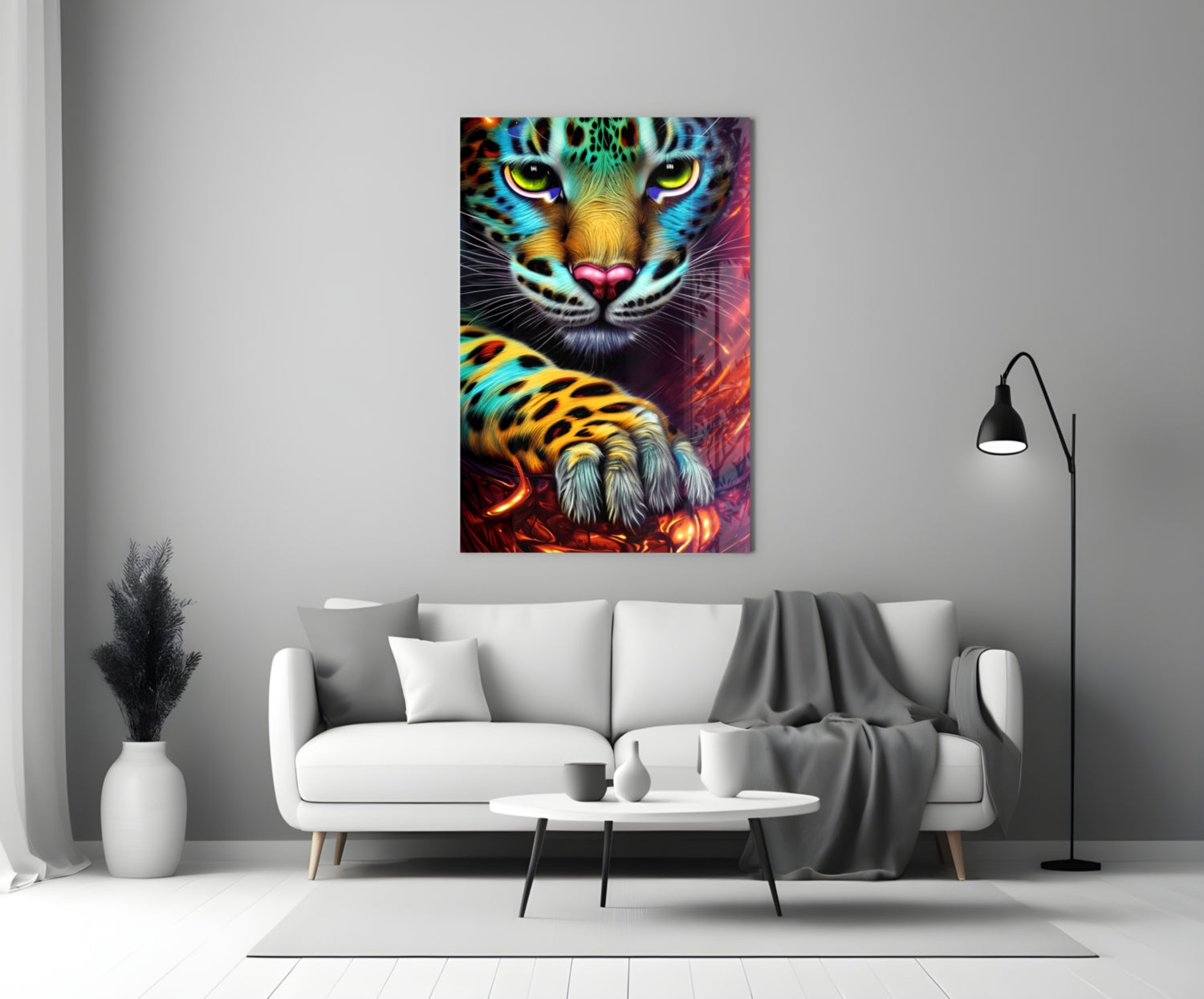 Colorful neon leopard face glass wall art displayed above white sofa in modern living room interior.