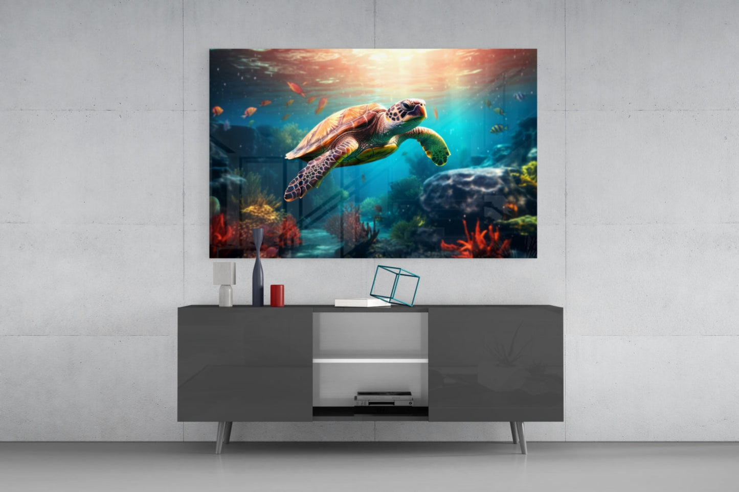 Sea turtle glass wall art hanging above dark media console, displaying underwater scene with coral and sunlight filtering through water.
