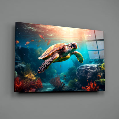 Sea turtle glass wall art mounted on gray wall, displaying underwater coral reef scene with sunlight filtering through water.