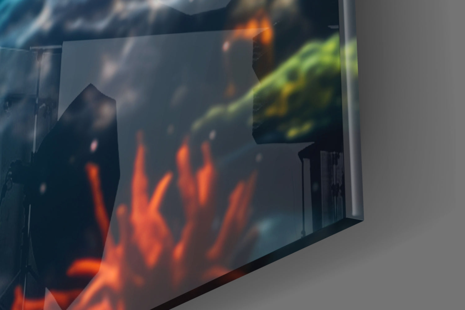Close-up angled view of glass wall art displaying a sea turtle with orange coral and green foliage against neutral wall.