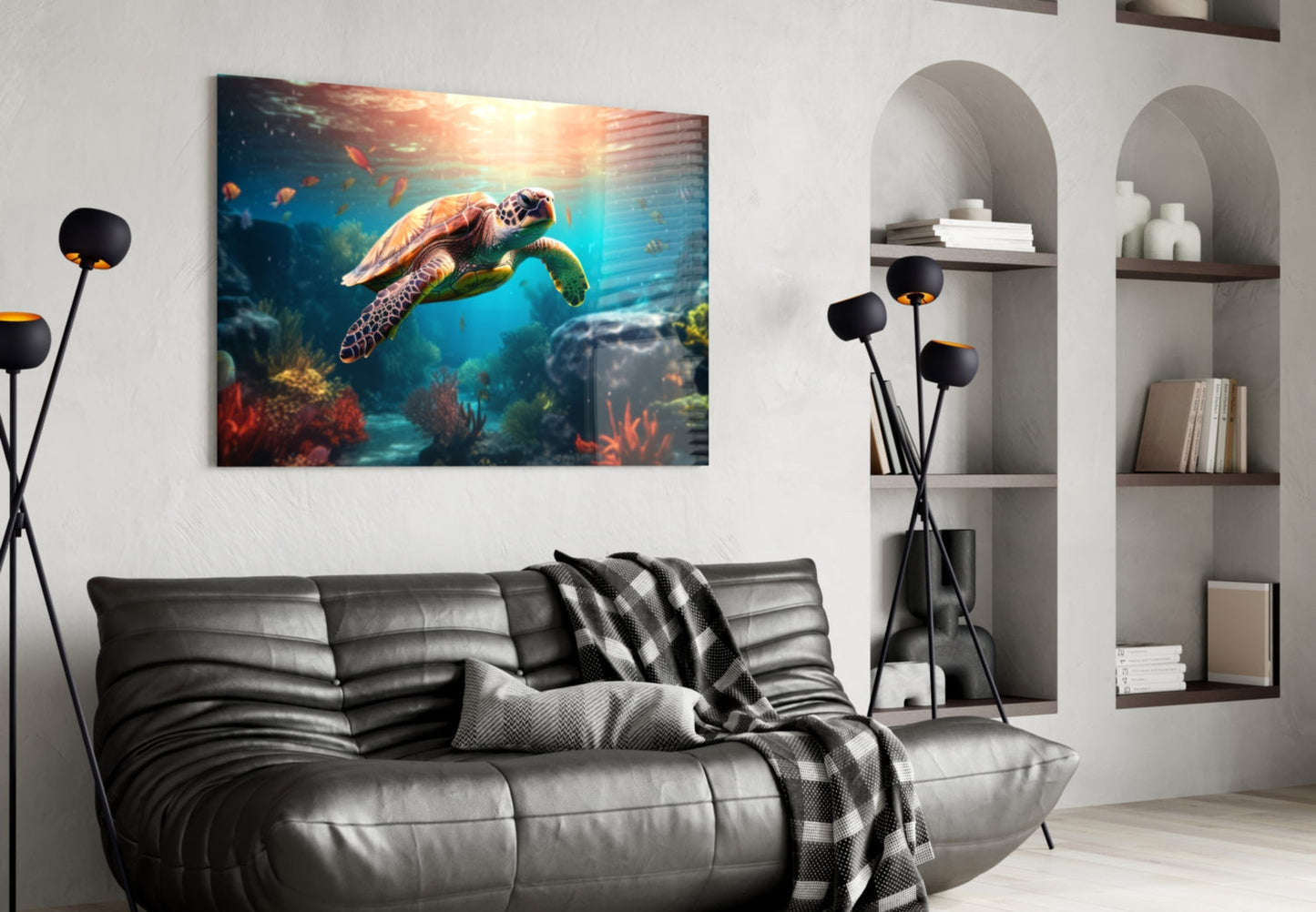 Sea turtle glass wall art displaying underwater coral reef scene mounted above gray leather sofa in modern living room.