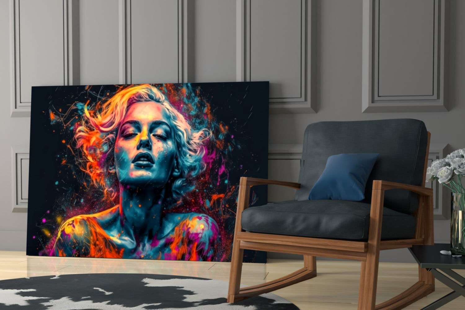 Colorful glass wall art featuring a vibrant portrait with neon orange, pink, and blue paint splatter effects displayed in a modern living room setting.