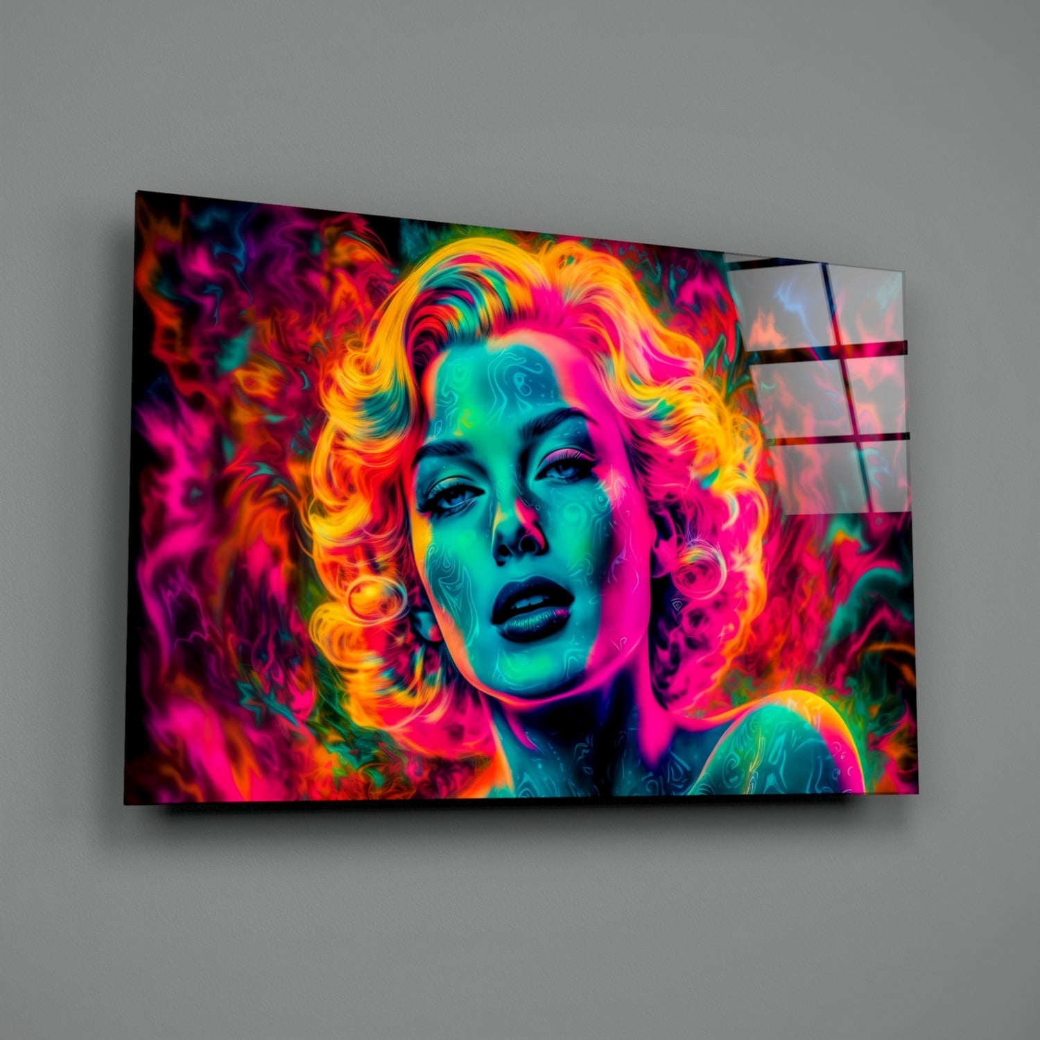 Vibrant neon pop art glass wall panel mounted on gray wall, featuring colorful portrait with magenta, cyan, and yellow tones.