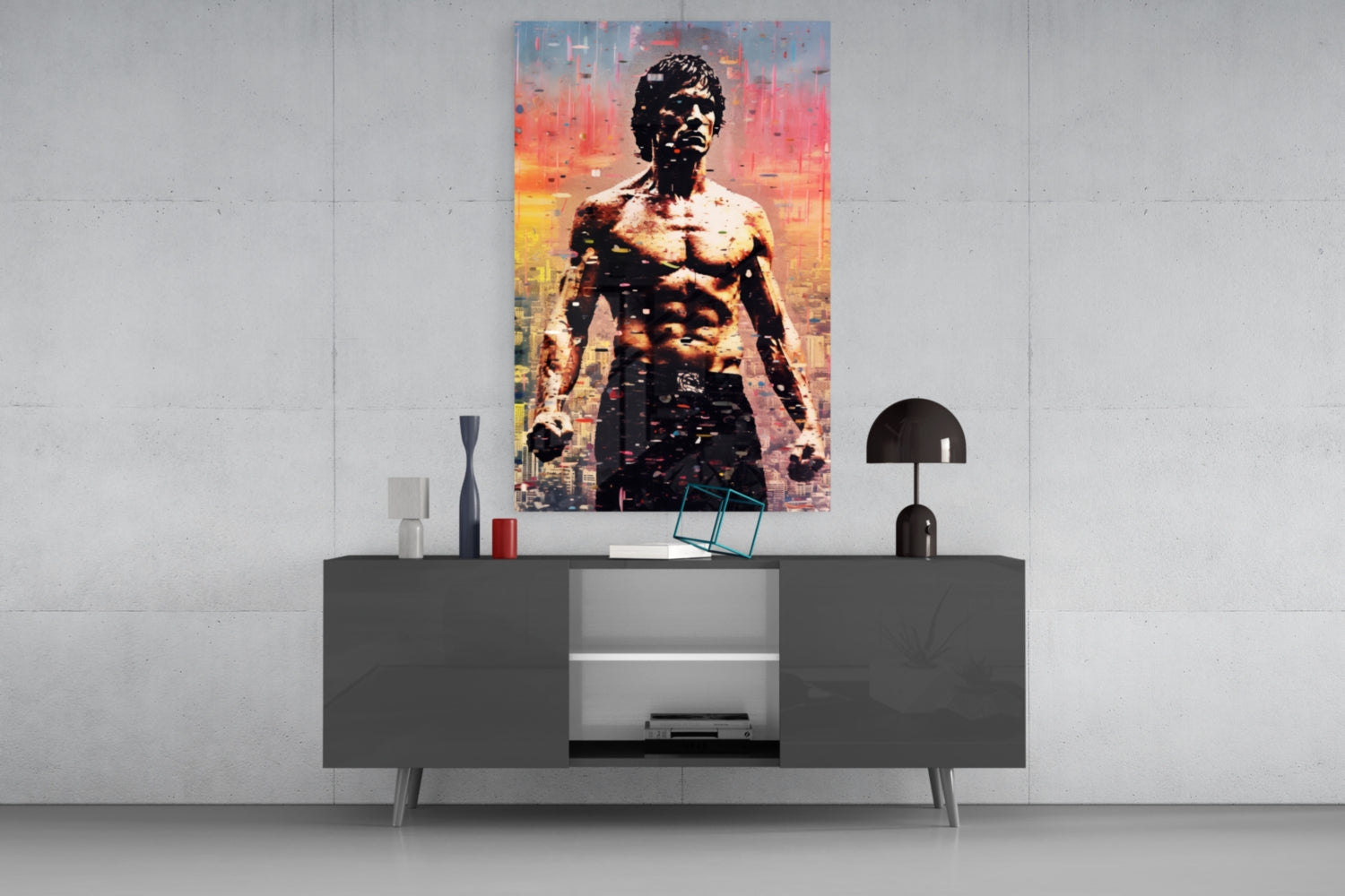 Colorful pop art glass wall panel featuring shirtless muscular man against orange and yellow cityscape backdrop, displayed above modern console table.