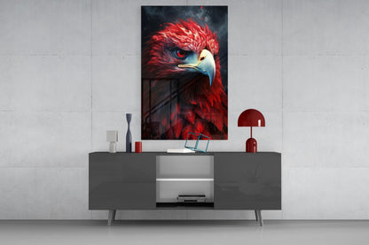 Red eagle glass wall art with crimson and gold plumage displayed above gray media console in modern interior setting.