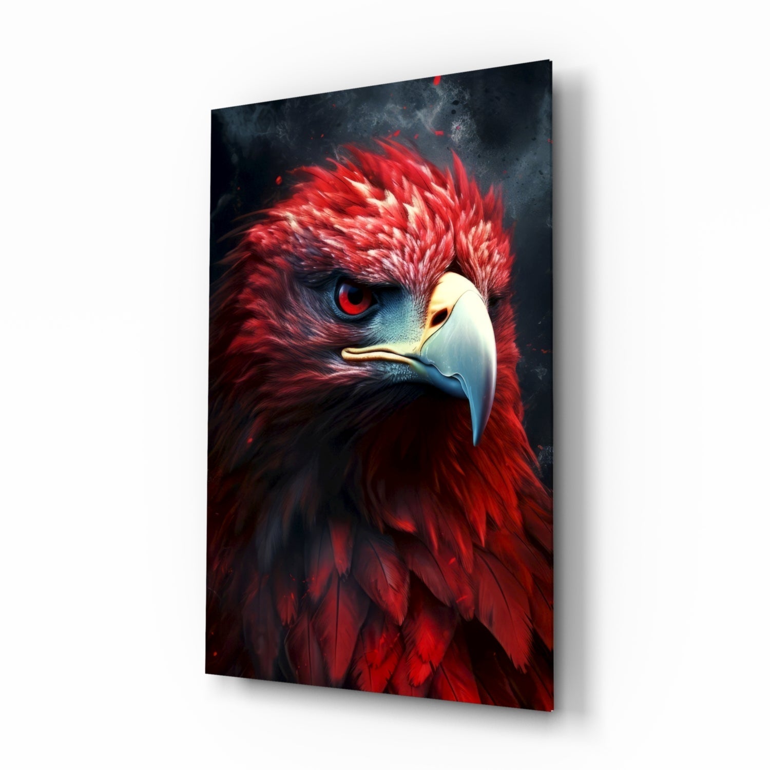 Red eagle glass wall art displayed at an angle, showing a fierce bird head with crimson feathers and piercing red eye against a dark background.