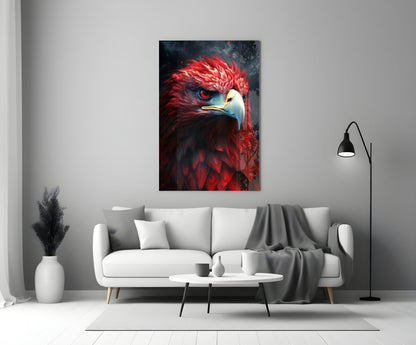 Red eagle glass wall art with vibrant red plumage and piercing blue eye displayed above white sofa in modern living room.