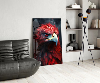 Red eagle glass wall art leaning against white wall in modern living room with gray sofa and shelving.