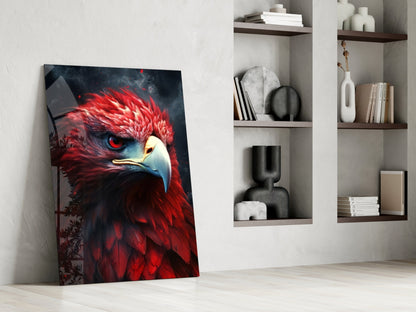 Red eagle glass wall art leaning against white wall beside shelving unit displaying decorative objects and books.