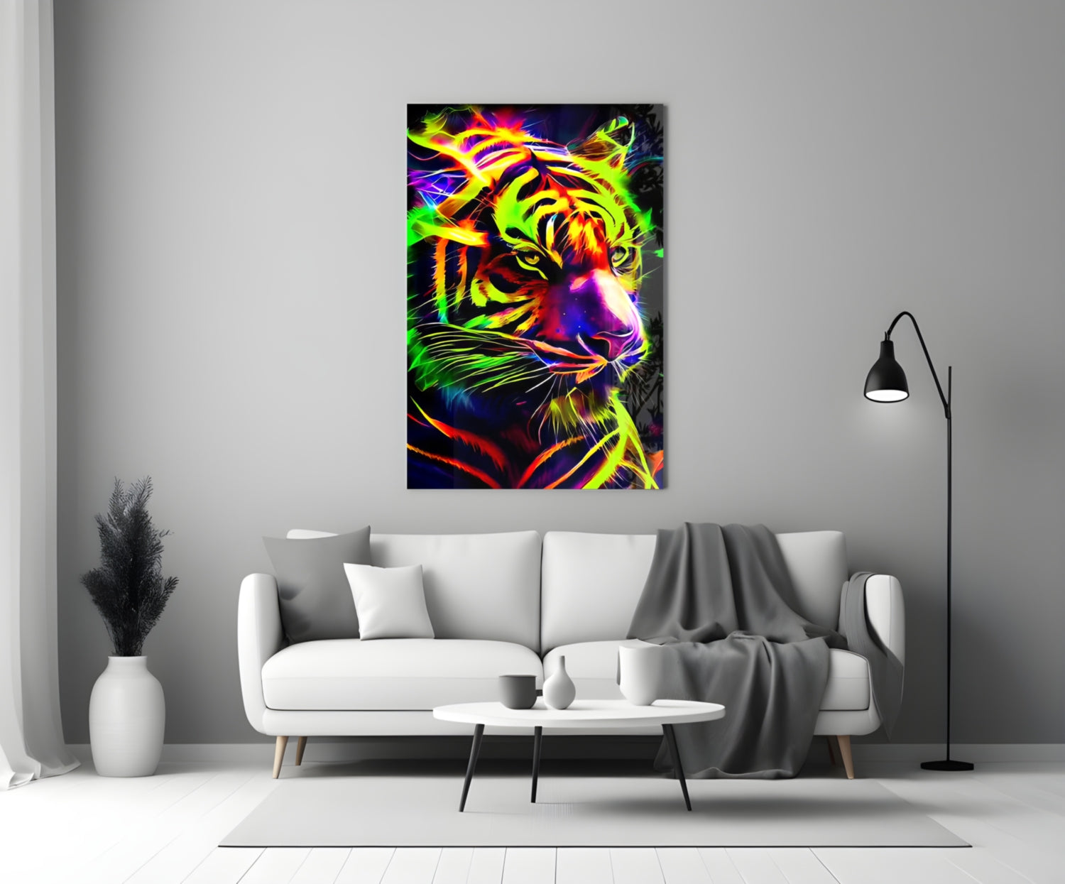 Vibrant neon tiger glass art hanging above white sofa in modern living room setting with floor lamp and decorative vase.
