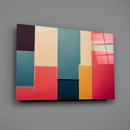 Colorful abstract rectangular glass wall art with teal, red, cream, burgundy, navy, and gold blocks arranged in a geometric pattern against a gray background.