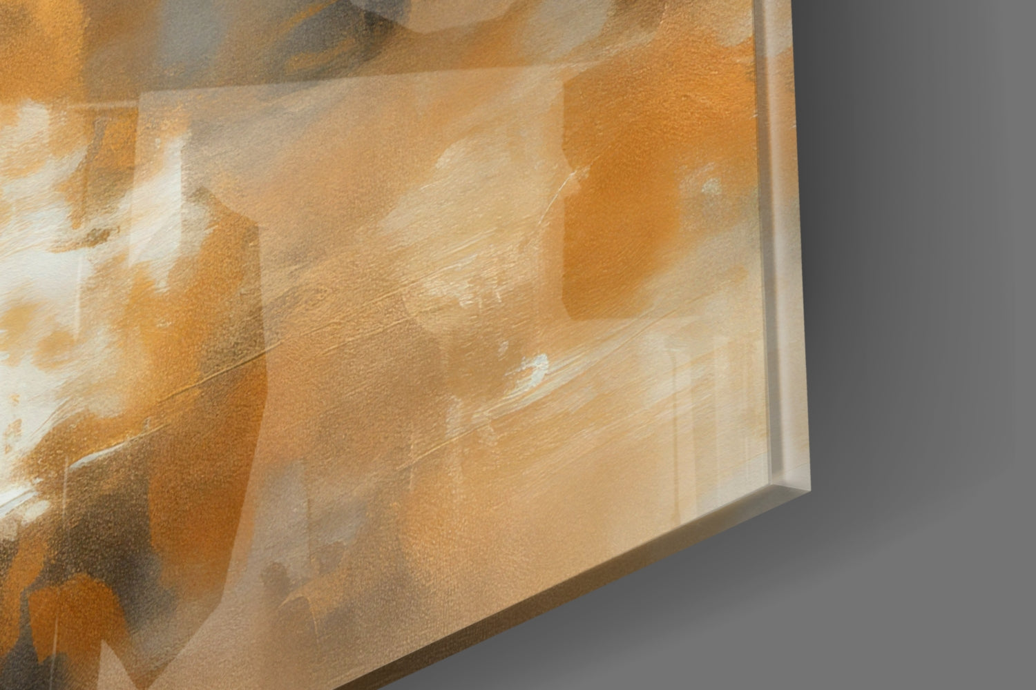Close-up edge view of abstract glass wall art with warm amber, cream, and white brushstroke patterns on frosted glass.