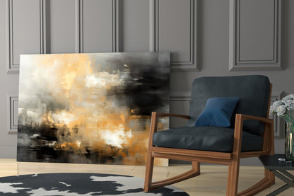 Abstract glass wall art with golden, black, and white swirled patterns displayed in modern living room setting with wooden chair.