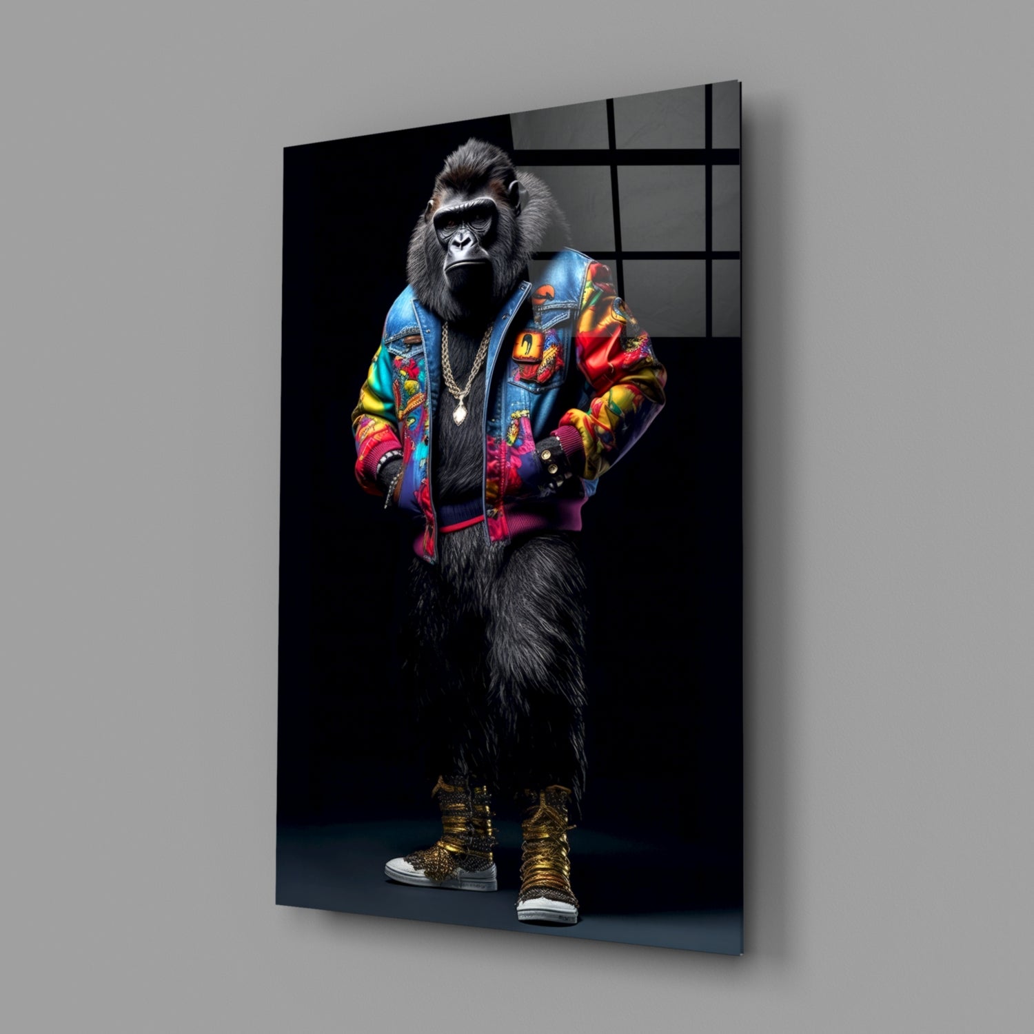 Glass wall art featuring a gorilla in a colorful embroidered jacket and gold boots against black background, displayed at an angle.