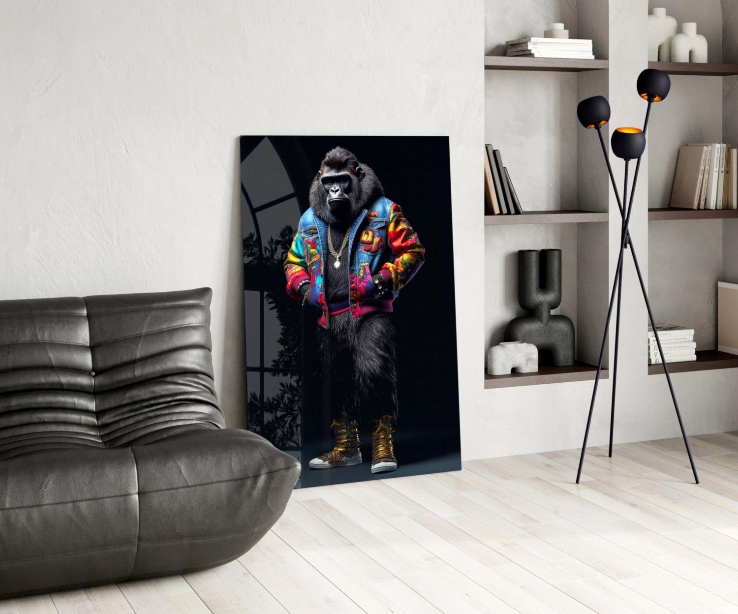 Modern living room displaying glass wall art of a stylized gorilla wearing a colorful jacket and gold sneakers against a black background.