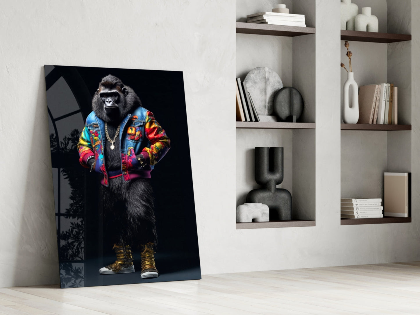 Stylized chimpanzee wearing a colorful blue and red jacket with gold sneakers, leaning against white wall beside shelving unit.