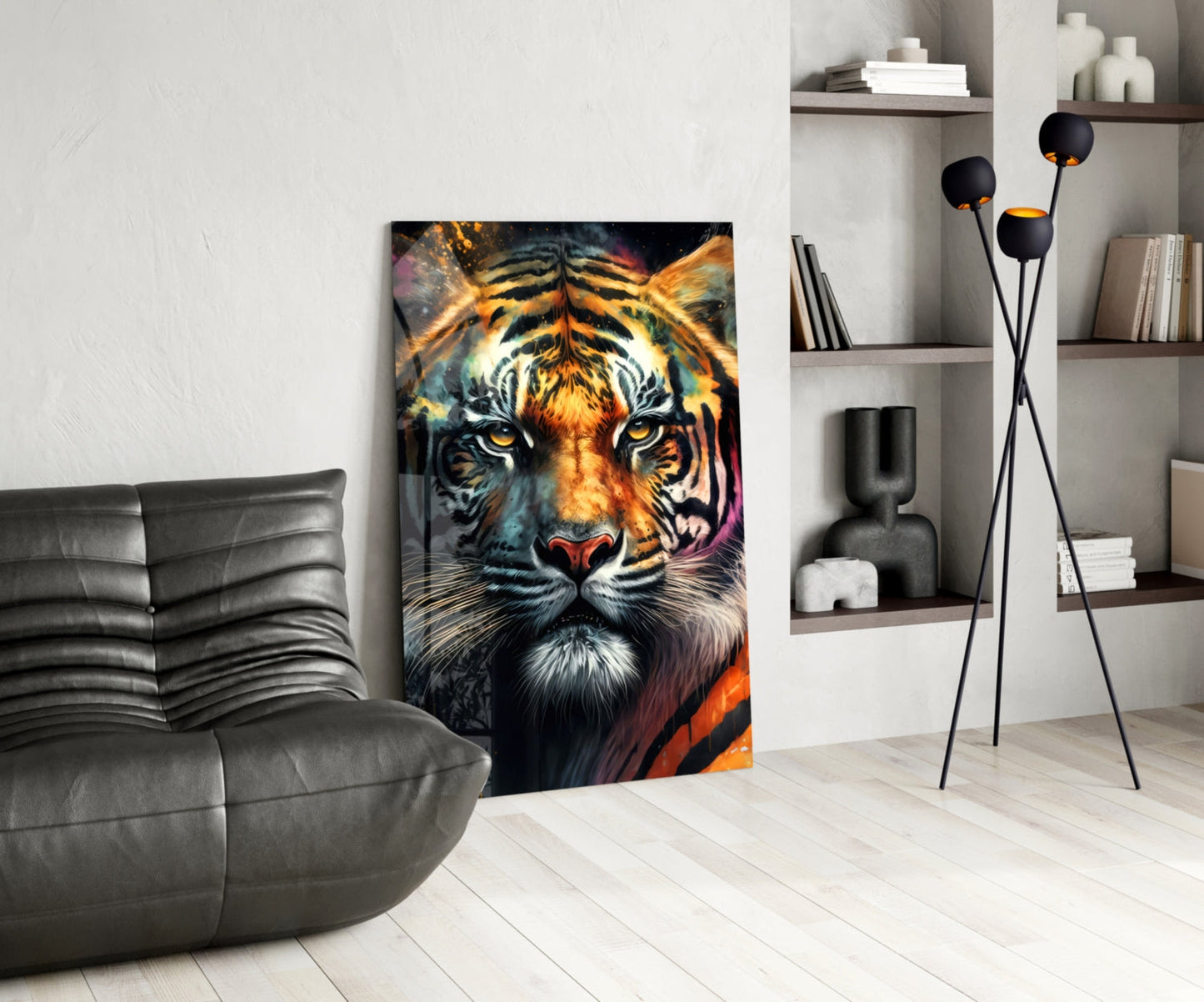 Colorful tiger face glass wall art displayed in modern living room with gray sofa and shelving.
