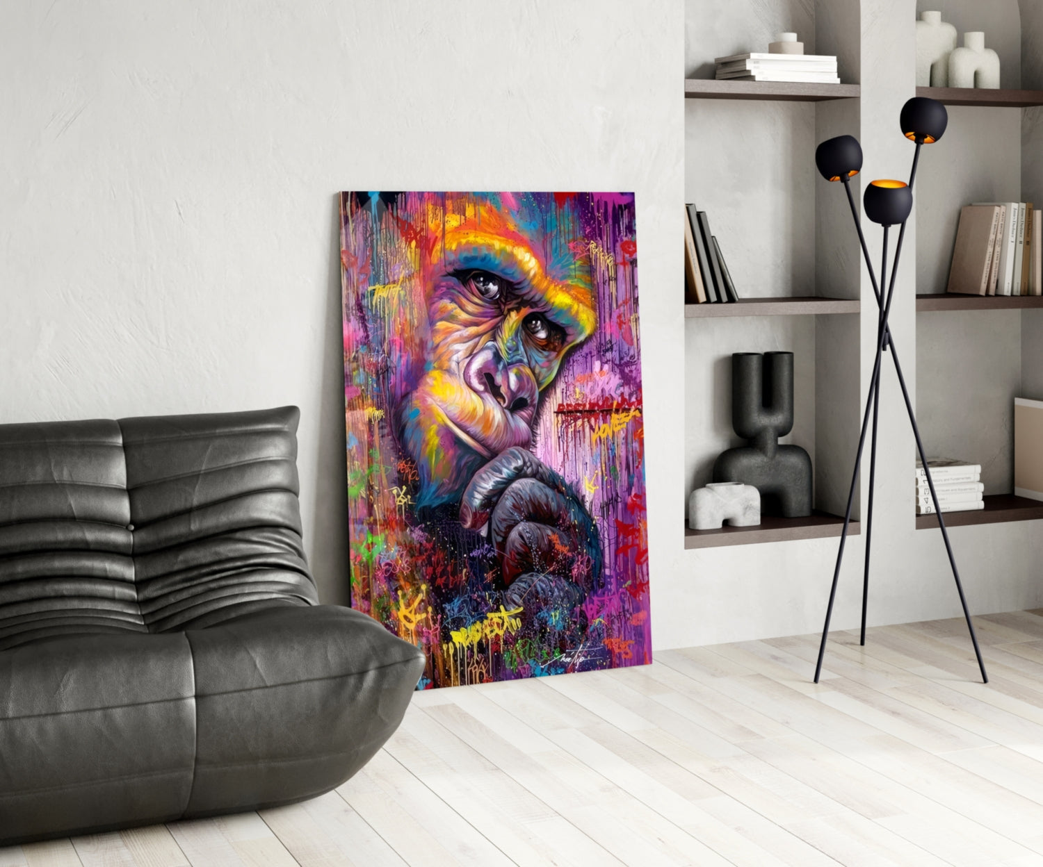 Vibrant colorful glass wall art depicting a stylized primate face with rainbow hues displayed in modern living room setting.
