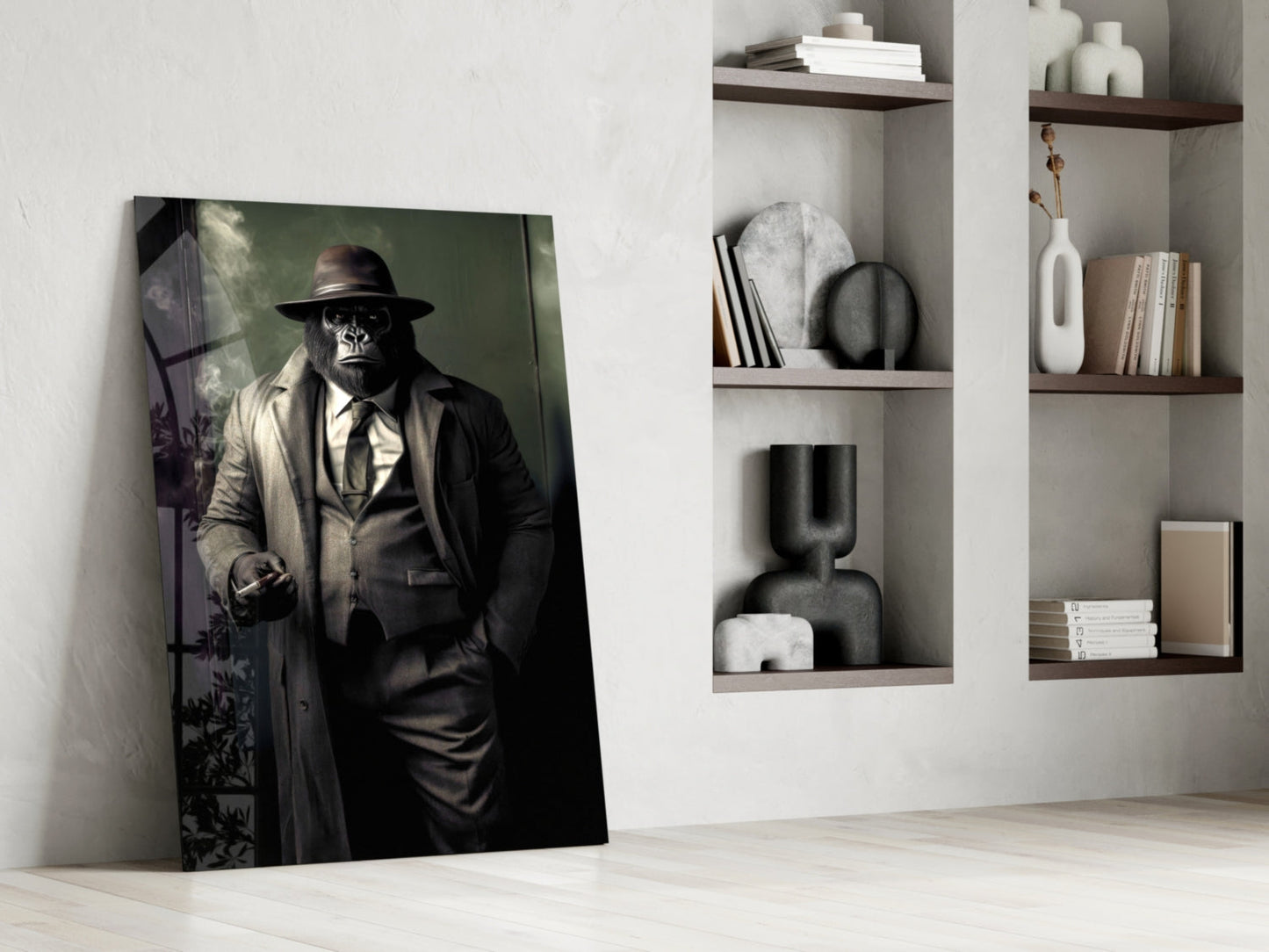 Glass wall art depicting a chimpanzee in formal attire with fedora hat and overcoat leaning against white shelving unit.