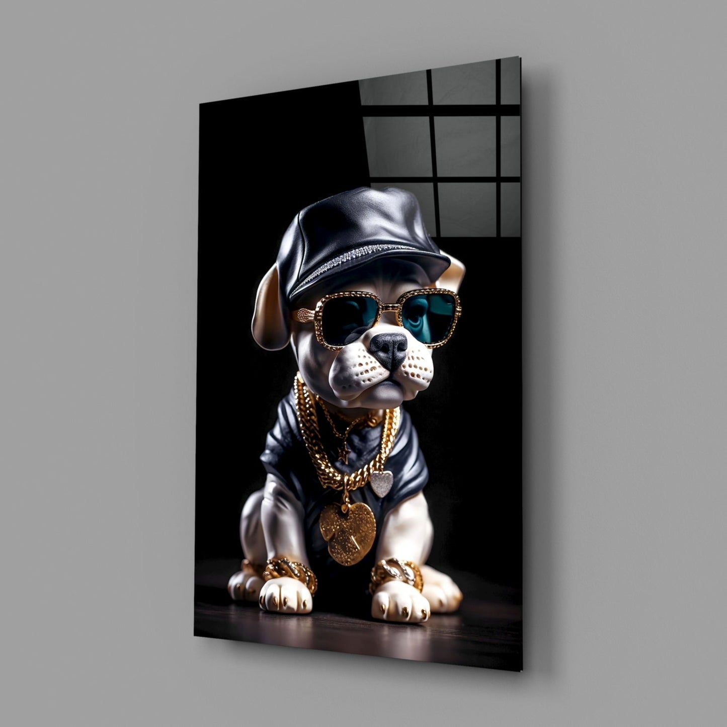 Stylized puppy wearing sunglasses, leather cap, and gold chain necklaces displayed on angled black glass panel against gray background.