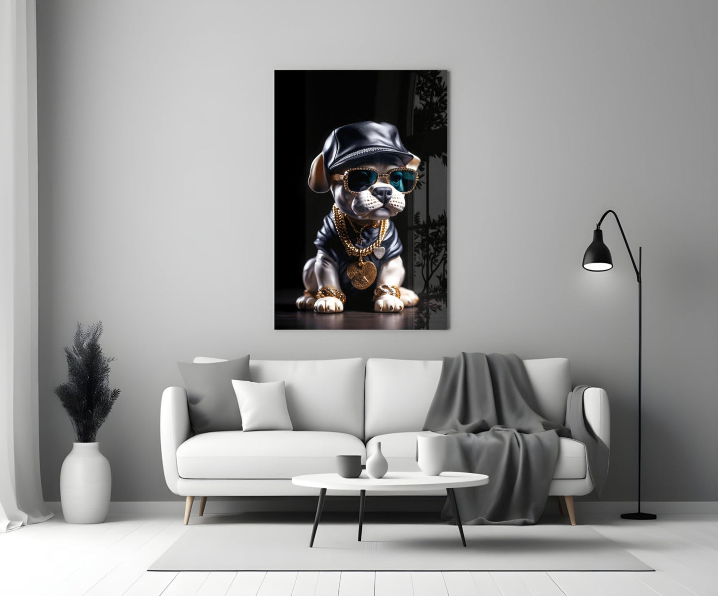 Stylized puppy wearing sunglasses, leather cap, and gold chain necklace displayed on white living room wall above sofa.