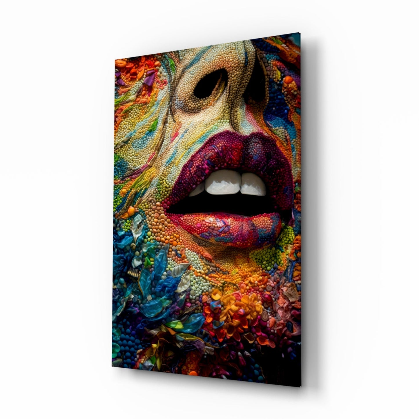 Angled view of glass wall art featuring vibrant multicolored textured lips and floral patterns in blues, oranges, reds, and greens.